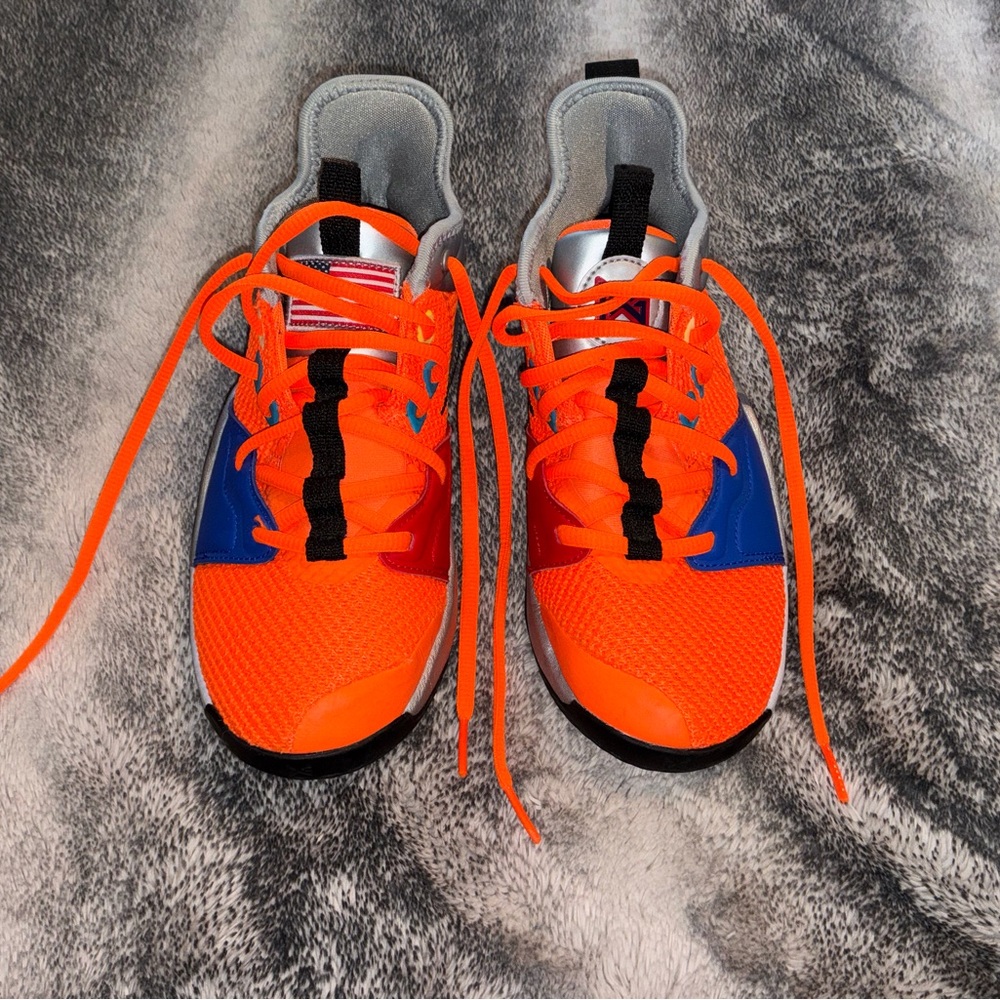 Has themed Nike Kids' Sneakers